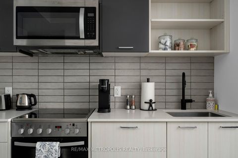 Photo 2 at 307 - 2300 St Clair Avenue W, Junction Area, Toronto