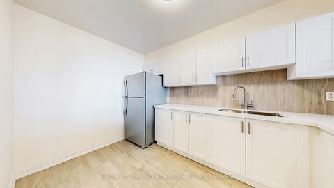 Photo 13 at 2002 - 55 Bamburgh Circle, Steeles, Toronto