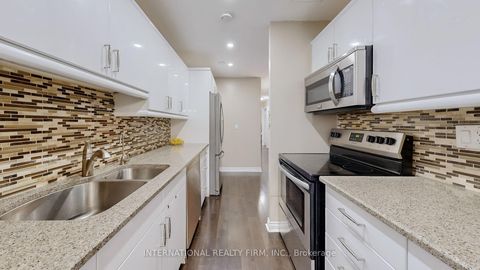 Photo 13 at 404 - 1200 Bridletowne Circle, L'Amoreaux, Toronto