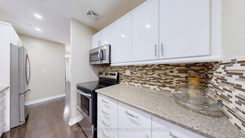 Photo 14 at 404 - 1200 Bridletowne Circle, L'Amoreaux, Toronto