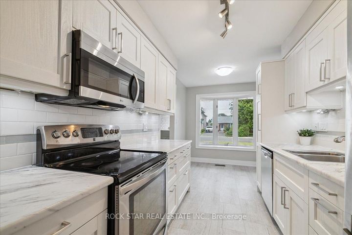 Photo 8 at 61 Adis Avenue, Gurnett, Hamilton