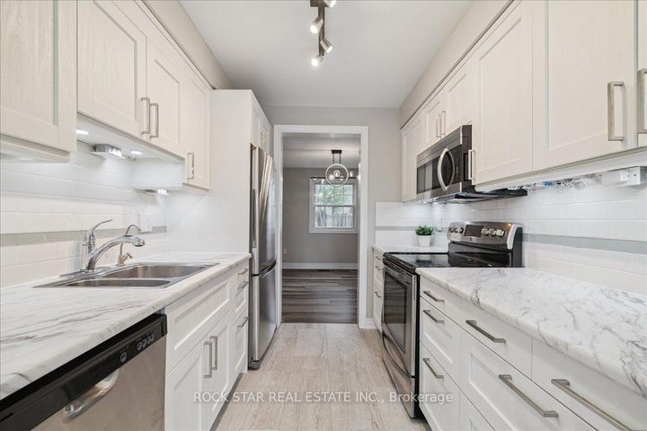 Photo 10 at 61 Adis Avenue, Gurnett, Hamilton