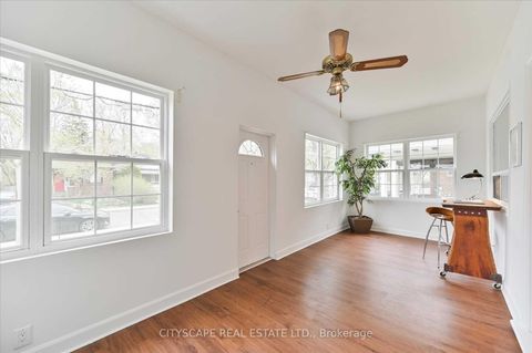 Photo 2 at 15 Midburn Avenue, Crescent Town, Toronto