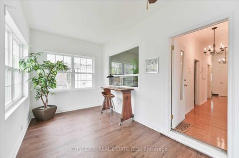 Photo 3 at 15 Midburn Avenue, Crescent Town, Toronto