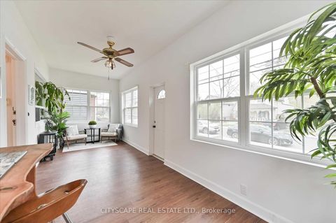 Photo 4 at 15 Midburn Avenue, Crescent Town, Toronto