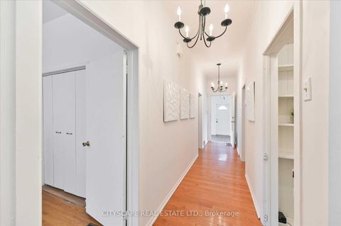 Photo 6 at 15 Midburn Avenue, Crescent Town, Toronto