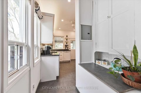 Photo 12 at 15 Midburn Avenue, Crescent Town, Toronto