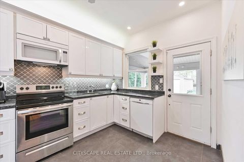 Photo 13 at 15 Midburn Avenue, Crescent Town, Toronto
