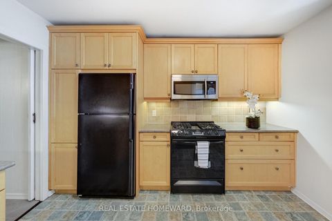 Photo 13 at 111 Parkmount Road, Coxwell, Toronto