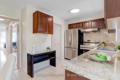 Photo 12 at 23 Thimble Berry Way, Hillcrest Village, Toronto