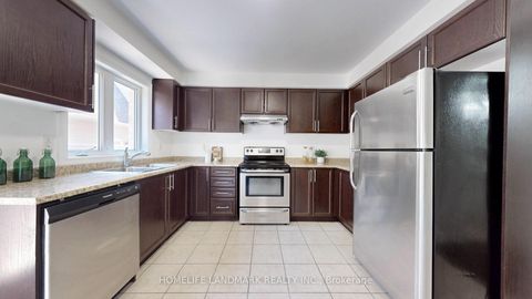 Photo 9 at 7 Kawneer Terrace, Dorset Park, Toronto