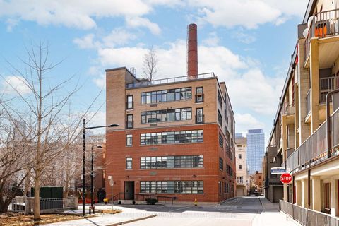 Photo 1 at 302 - 10 Wellesley Place, North St. James Town, Toronto