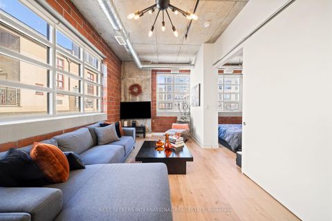 Photo 6 at 302 - 10 Wellesley Place, North St. James Town, Toronto