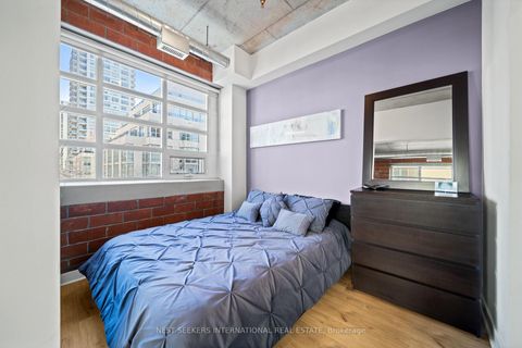Photo 15 at 302 - 10 Wellesley Place, North St. James Town, Toronto