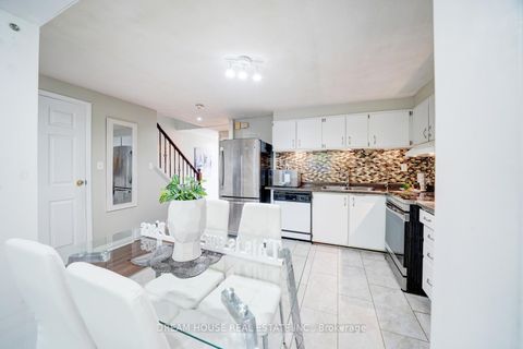 Photo 9 at 106 - 850 Huntingwood Drive, L'Amoreaux, Toronto
