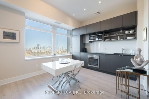 Photo 2 at 1728 - 111 St Clair Avenue W, St. Clair, Toronto