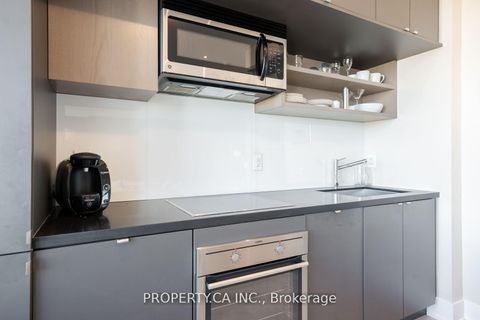 Photo 23 at 1728 - 111 St Clair Avenue W, St. Clair, Toronto