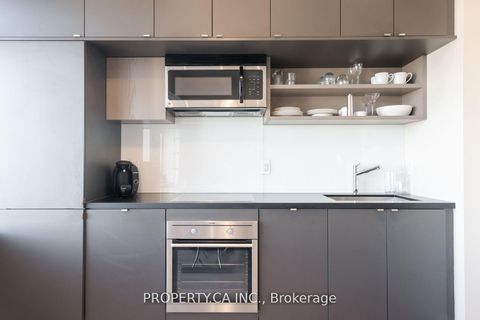 Photo 25 at 1728 - 111 St Clair Avenue W, St. Clair, Toronto