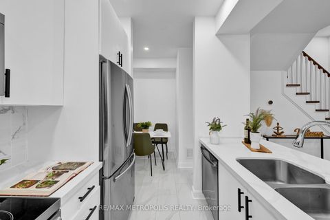 Photo 12 at TH55 - 295 Village Green Square, Malvern West, Toronto