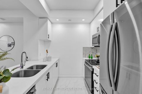 Photo 13 at TH55 - 295 Village Green Square, Malvern West, Toronto