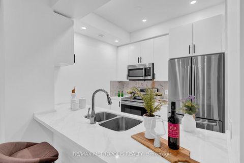 Photo 16 at TH55 - 295 Village Green Square, Malvern West, Toronto