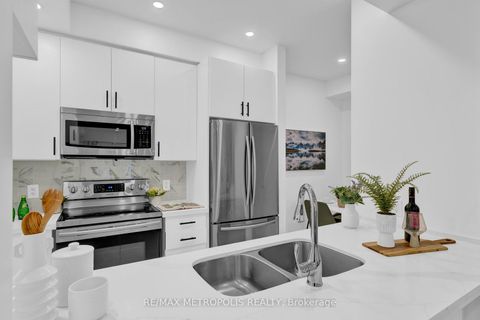 Photo 17 at TH55 - 295 Village Green Square, Malvern West, Toronto
