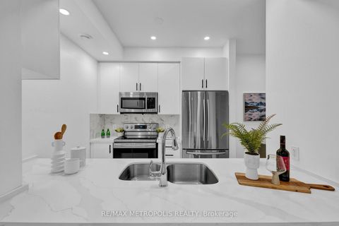Photo 18 at TH55 - 295 Village Green Square, Malvern West, Toronto