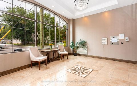 Photo 3 at 302 - 205 Lakeshore Road W, CO Central, Oakville