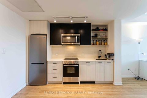 Photo 5 at 308 - 2300 St Clair Avenue W, Junction Area, Toronto