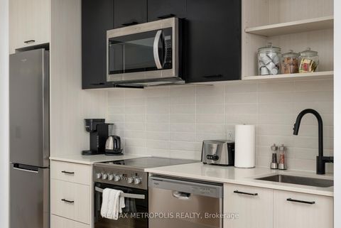 Photo 5 at 407 - 2300 St Clair Avenue W, Junction Area, Toronto