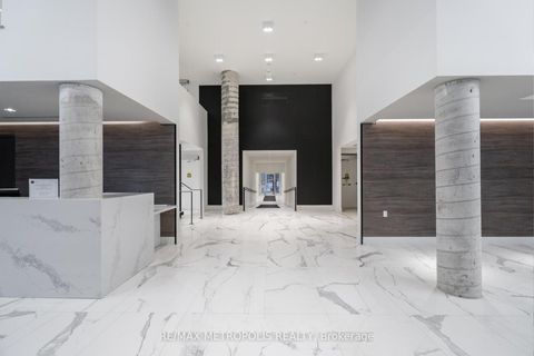 Photo 1 at 311 - 2908 Highway 7, Concord, Vaughan