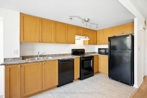 Photo 5 at 311 - 45 Strangford Lane, Birchmount, Toronto