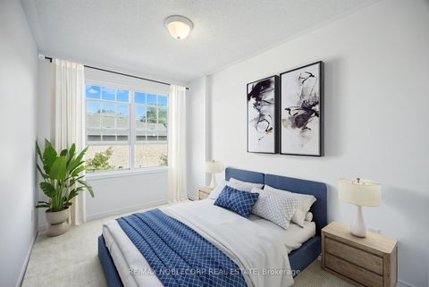 Photo 10 at 311 - 45 Strangford Lane, Birchmount, Toronto