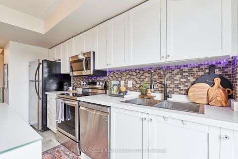 Photo 7 at 312 - 25 Strangford Lane, Birchmount, Toronto