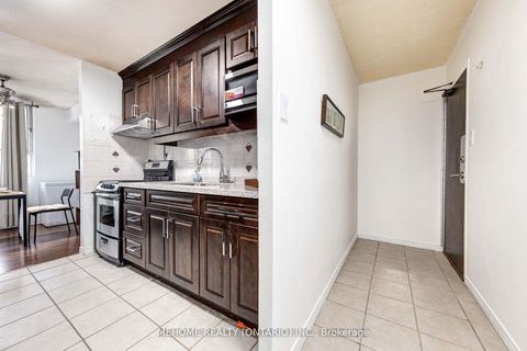 Photo 1 at 207 - 1950 Kennedy Road, Dorset Park, Toronto