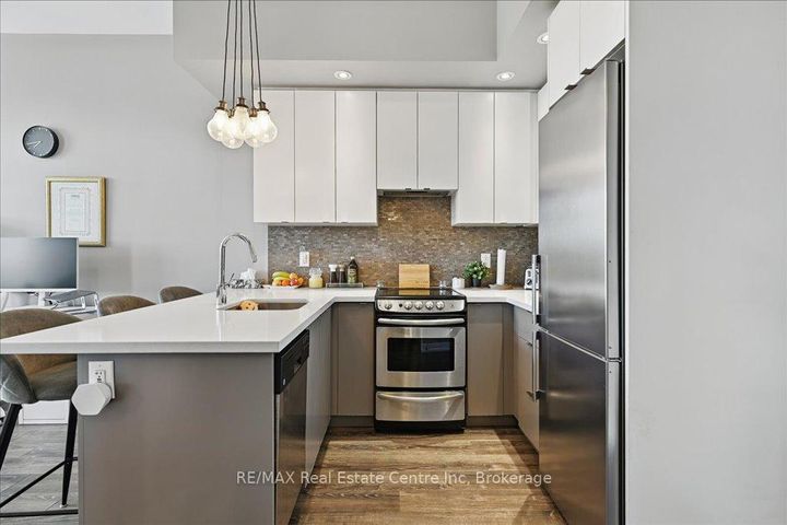 Photo 1 at 420 - 457 Plains Road E, LaSalle, Burlington