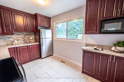 Photo 5 at 134 Song Meadowway, Hillcrest Village, Toronto