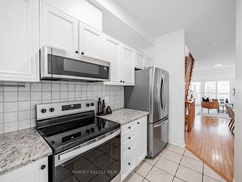 Photo 4 at 52 Market Garden Mews, Queensway, Toronto
