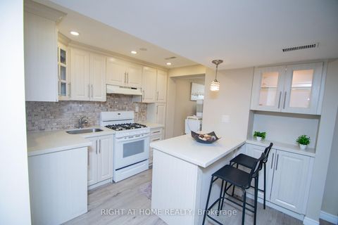 Photo 4 at 65 Bridgenorth Crescent, Beaumonde Heights, Toronto