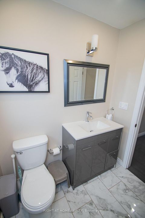 Photo 10 at 65 Bridgenorth Crescent, Beaumonde Heights, Toronto