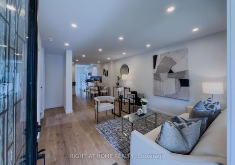 Photo 4 at 32 Brenton Street, Crescent Town, Toronto