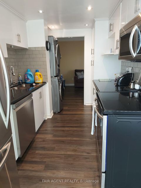Photo 1 at 409 - 3077 Weston Road, Pelmo Park W5, Toronto