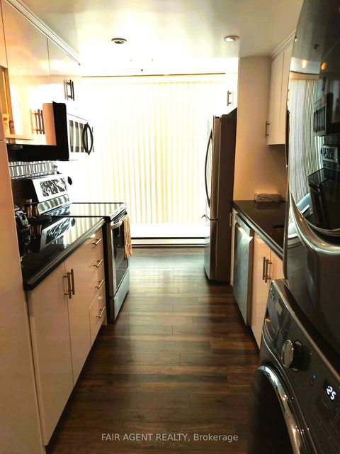 Photo 2 at 409 - 3077 Weston Road, Pelmo Park W5, Toronto