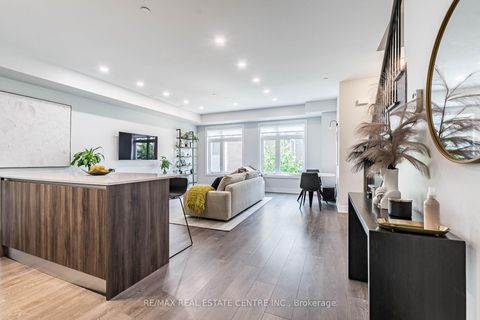 Photo 2 at 12 - 66 Long Branch Avenue, Long Branch, Toronto