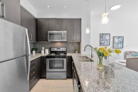 Photo 4 at 103 - 840 Queen's Plate Drive, Clairville, Toronto