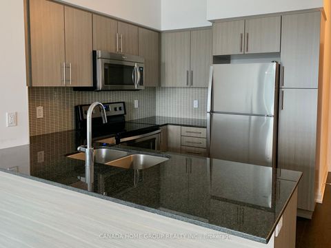 Photo 6 at 1410 - 65 Speers Road, CO Central, Oakville