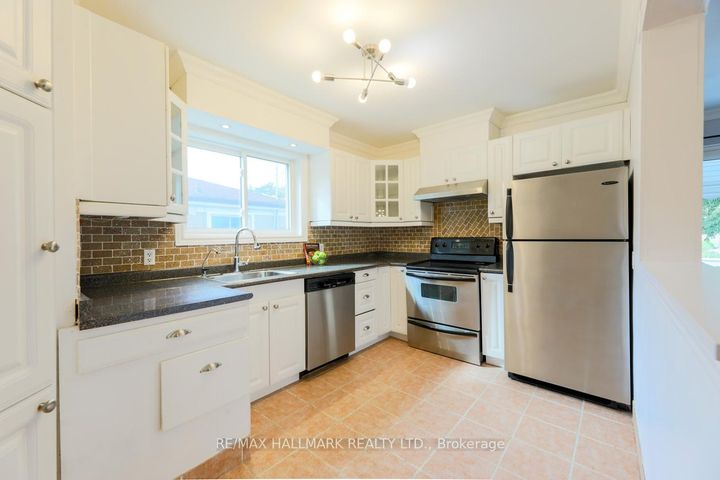 Photo 6 at 67 Trinnell Boulevard, Birchmount, Toronto