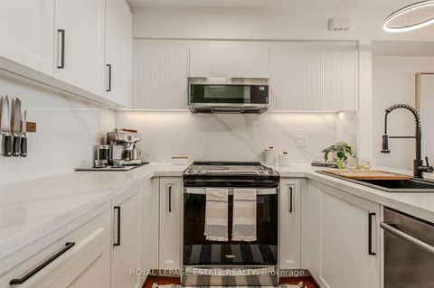 Photo 1 at 32 - 1209 Queen Street E, South Riverdale, Toronto