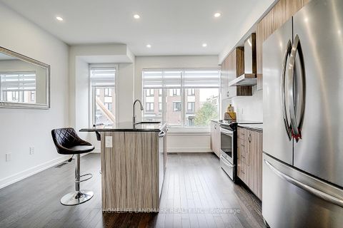 Photo 10 at 165 Salterton Circle, Rural Vaughan, Vaughan