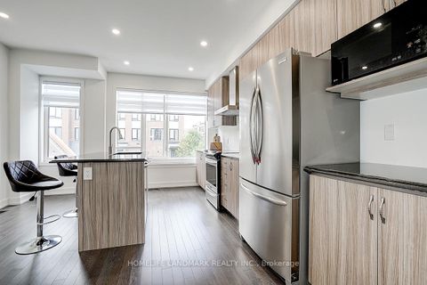 Photo 11 at 165 Salterton Circle, Rural Vaughan, Vaughan
